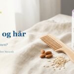 Biotin og hår: hvor slutter dokumentasjonen? Trekam, mandler, havregryn og Collarose-boks med biotin på lin i dagslys.